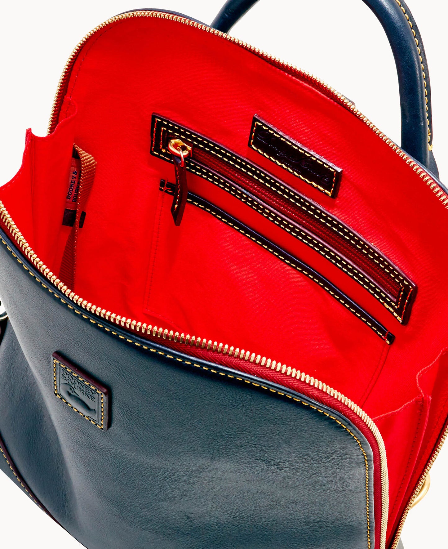 41. Authentic Dooney & Bourke Zip Pod Backpack with Wallet- $175