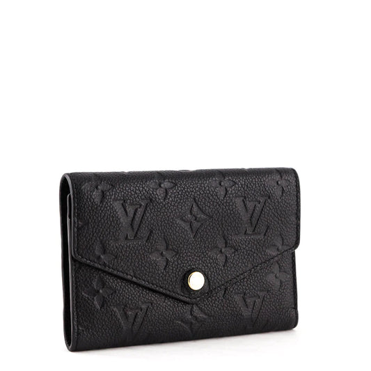 30. Louis Vuitton Monogram Empreinte Compact Curieuse Wallet Black- $115